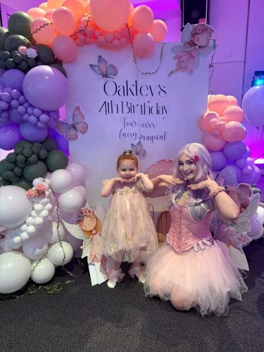 Blossom the Pink Fairy Blossom the Pink Fairy has a Pink and Purple Corset and Tutu and Purple Wings